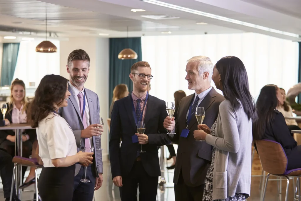 Business guests networking with drinks at a corporate event